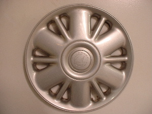 97-00 Voyager hubcaps with sailboat logo