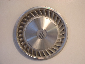 92-94 Topaz hubcaps