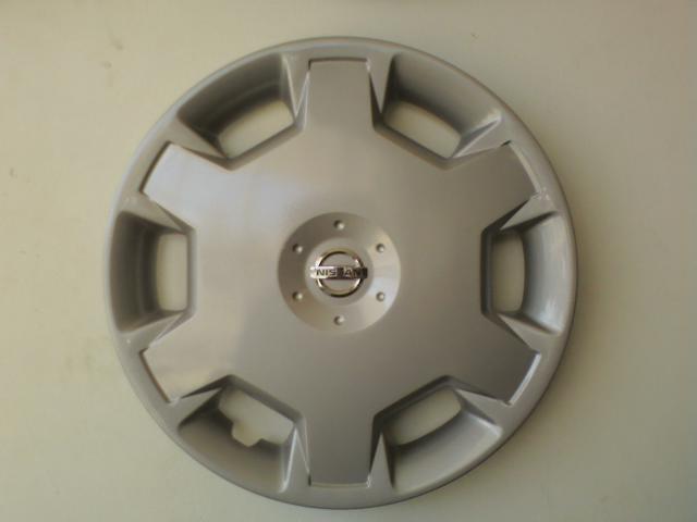 87 Stanza hubcaps