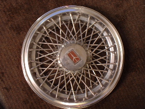 Cutlass wire spoke hubcaps