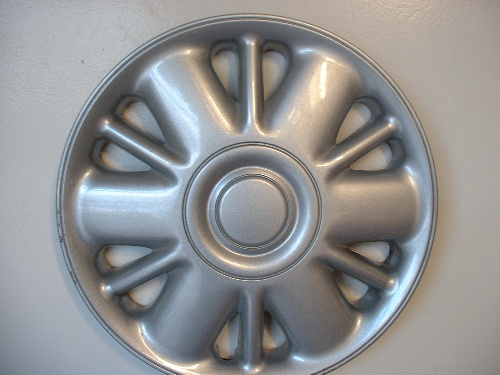 00 Plymouth Voyager hubcaps no sailboat logo